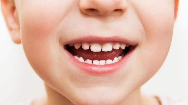 Efek Sering Buka Kemasan Plastik Pakai Gigi untuk Anak/ Foto: thinkstock Efek Sering Buka Kemasan Plastik Pakai Gigi untuk Anak/ Foto: thinkstock