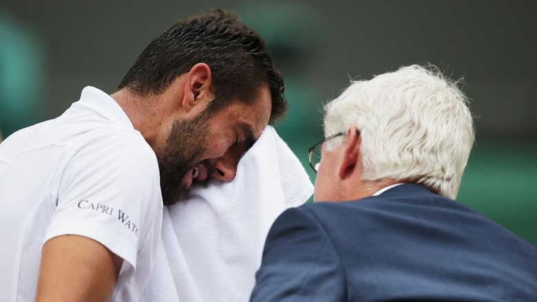 Tangisan Cilic dalam Kekalahannya dari Federer Tangisan Cilic dalam Kekalahannya dari Federer