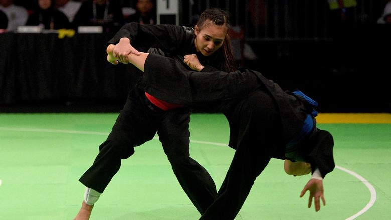 Berakhirnya Penantian Pesilat Wewey Wita akan Emas SEA Games Berakhirnya Penantian Pesilat Wewey Wita akan Emas SEA Games