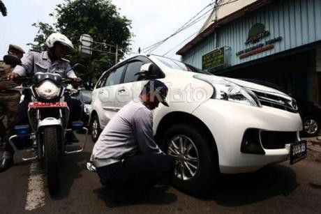 Razia Parkir Liar Tak Efektif, Ini Penyebabnya. Razia Parkir Liar Tak Efektif, Ini Penyebabnya.